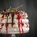 Black forest pavlova prepared with Macphie Mactop Traditional cream alternative