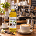 Monin Vanilla Syrup 1L at a cafe latte preparation station